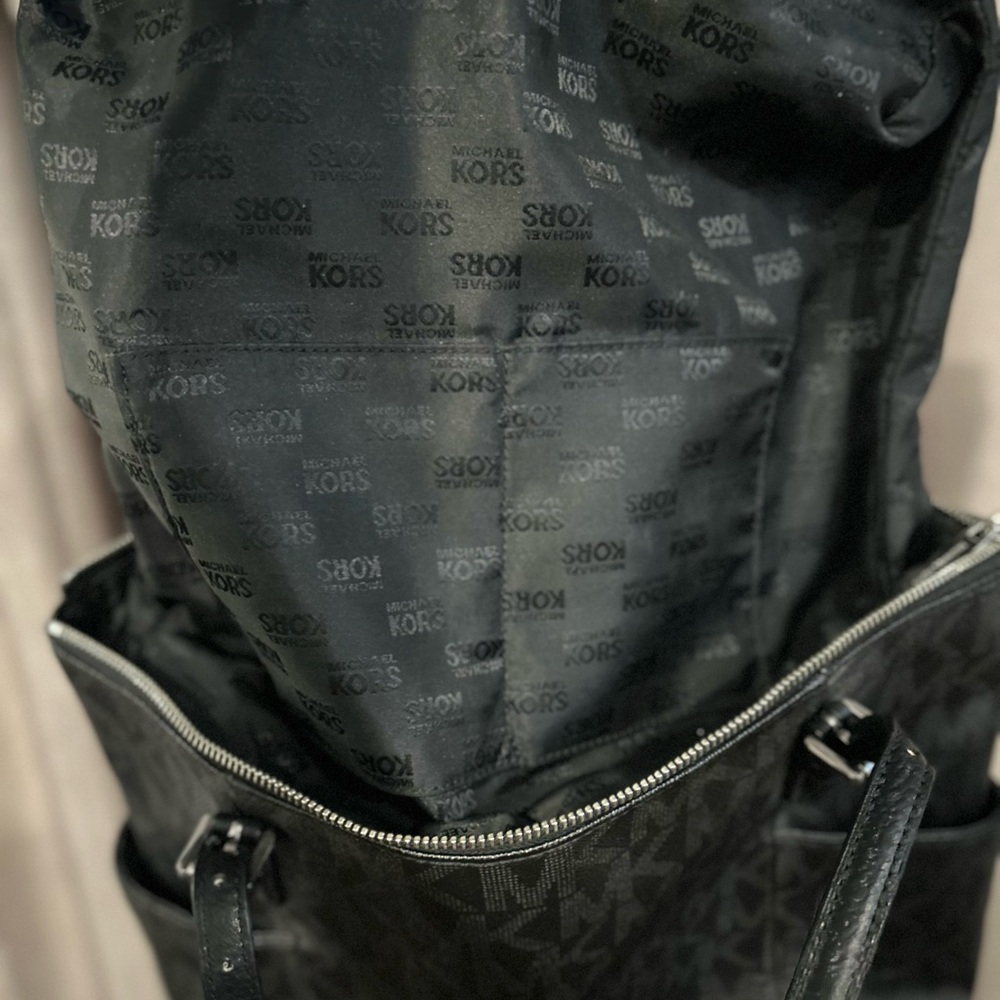 Michael Kors Black Tote Bag with MK logo throughout bag. - Picture 6 of 16